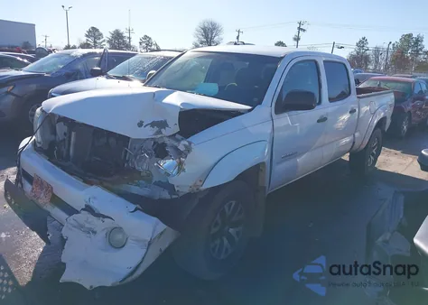 2009 Toyota Tacoma Base V6 из США, поврежденный, VIN 3TMMU52N49M014277